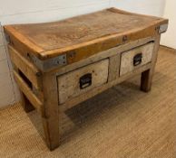 A large reclaimed butchers block on a pine two drawer stand (H70cm W122cm D69cm)