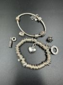 A Links of London silver sweetie bracelet along with a Pandora charm bracelet.