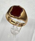 A gold signet ring with carnelian inset. approximate total weight 8.2g marked 625 for 15ct.
