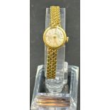 An 18ct gold ladies watch by Bucherer, bracelet AF, approximate total weight 16.6g