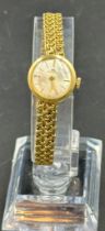 An 18ct gold ladies watch by Bucherer, bracelet AF, approximate total weight 16.6g