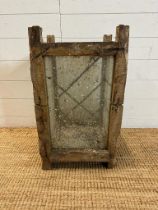 A rustic umbrella or hat stand with leaded glass side and front H60cm