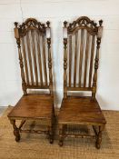 A pair of oak style farmhouse chairs