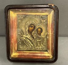 A Russian icon in glazed case 18cm x 20cm