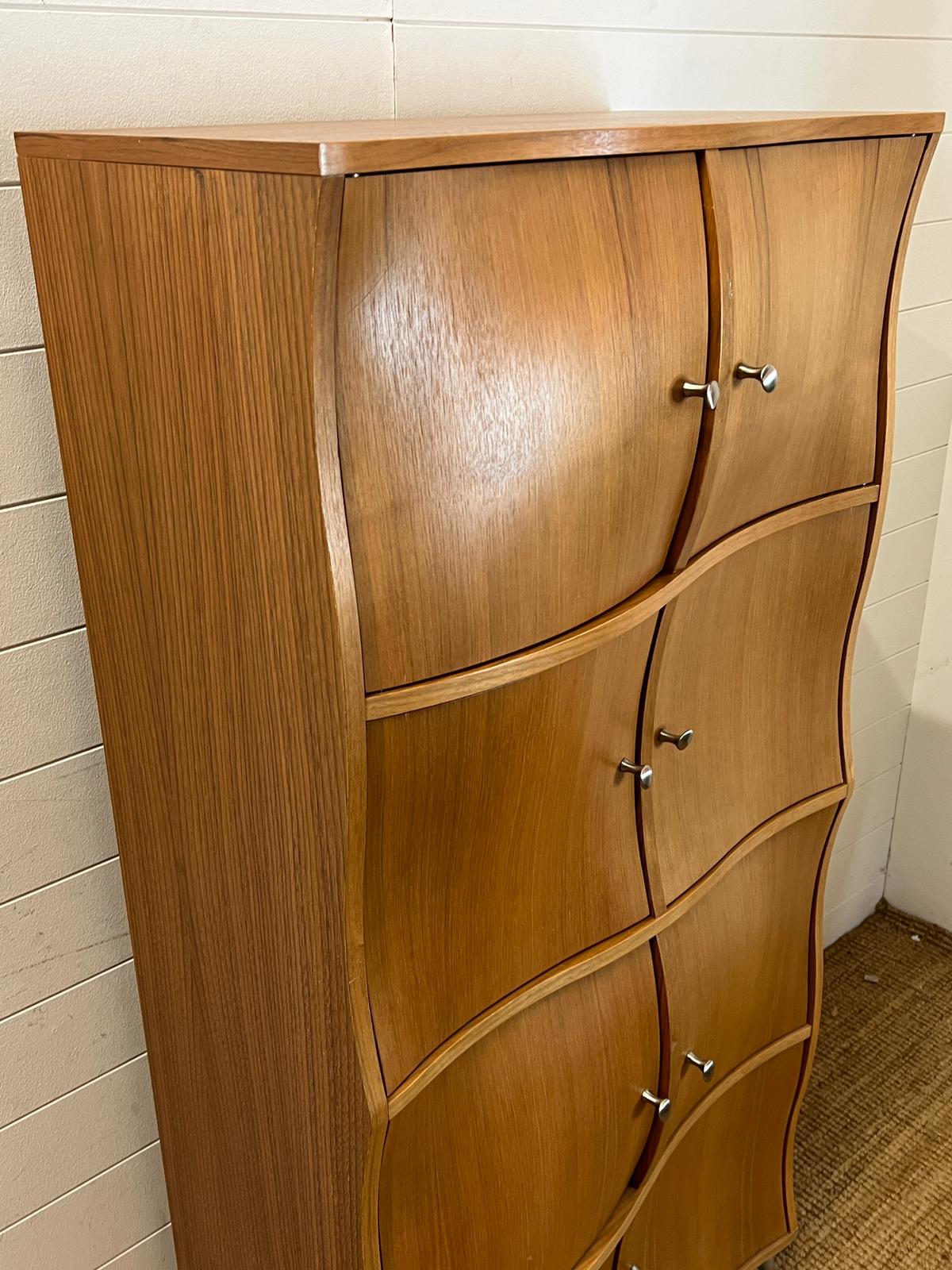 A contemporary wave front cabinet with eight compartments on chrome legs (74cm x 38cm x 155cm) - Image 3 of 3