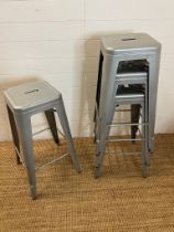 Four silver bistro bar stools