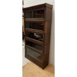 A five tier Casler oak and glazed,barristers bookcase (H166cm W87cm D30cm)