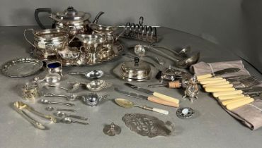 A large volume of silverplated items to include a tea service etc.