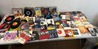 A large collection of records all 45's of 70's 80's, pop, rock and soul music various conditions
