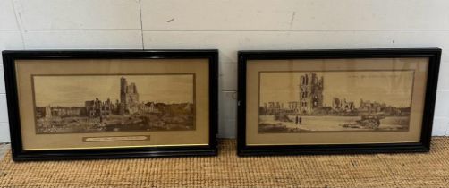 Two framed black and white photographs of World War One battle fields