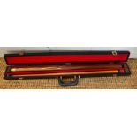 A cased snooker cue