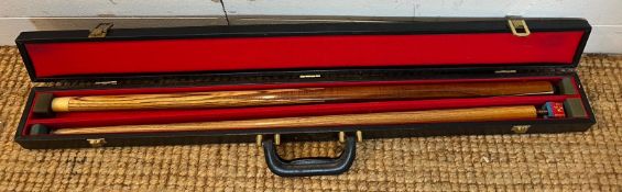 A cased snooker cue