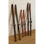 Three pairs of vintage wooden skis