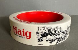 A ceramic Haigs Scotch whisky ash tray