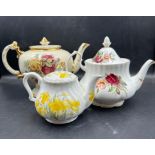 A selection of three teapots to include Royal Albert and Holly Barn