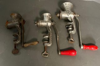 Three vintage metal meat grinders