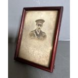 A portrait of a WWI medical Corp officer in an easel back frame