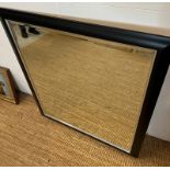 A large mirror with black frame 118cm x 130cm