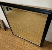 A large mirror with black frame 118cm x 130cm