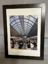 A Busy Day at Kings Cross station, signed