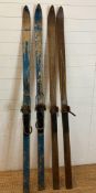 Two pairs of vintage wooden skis