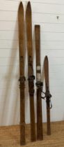 A selection of four vintage wooden skis