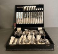 A six place setting canteen of cutlery, boxed.