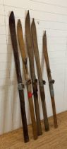 A selection of five vintage wooden skis