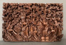 A carved Balinese wall panel depicting a pastoral fruit harvest 42x27