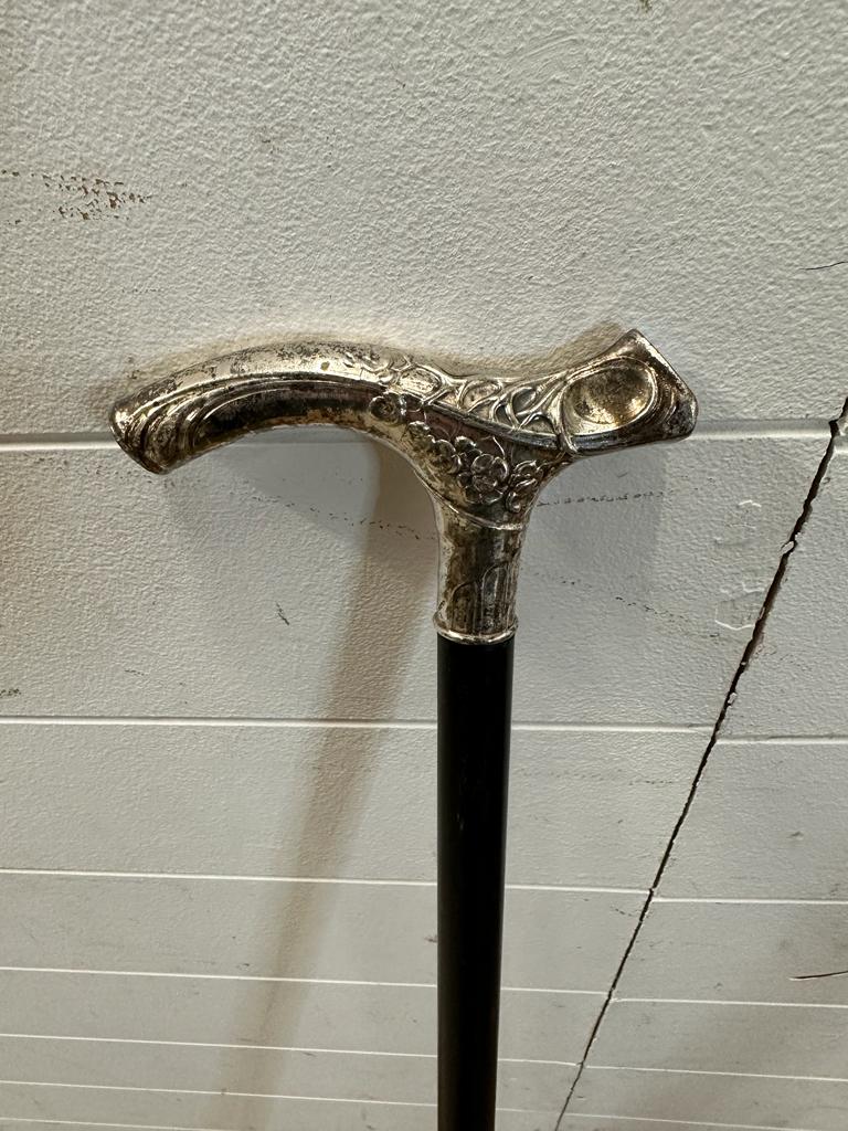 A black painted walking cane with an Art Deco style white metal handle - Image 2 of 3