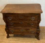 A wooden side cabinet with faux drawers opening to a cupboard (H65cm W74cm D40cm)