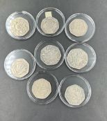 Coins: Eight collectable 50p pieces various designs