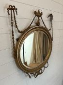A gilt framed wall hanging mirror in the Rococo style 70cm x 80cm