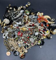 A large volume of costume jewellery, various styles and ages.