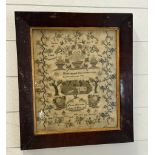 A sampler dated 1833 "Happy The Child Whose Youngest Years Receive Instruction Well" 42cm x 47