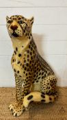 A vintage ceramic painted floor standing leopard (H68cm W47cm)