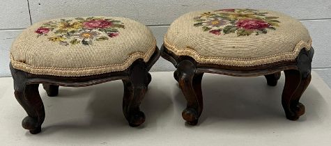 A pair of Victorian foot stools with needle work top
