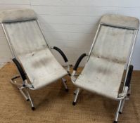 A pair of foldable rocking garden chairs AF