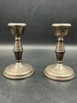 A pair of silver candlesticks by B & Co. hallmarked for Birmingham 1972 11cm H