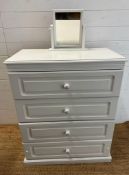 A white four drawer chest of drawers with a framed white bathroom mirror (H92cm W77cm D44cm)