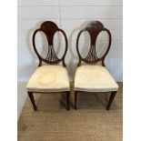 Two Hepple white style chairs