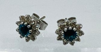 A pair of 18ct white gold topaz and diamond earrings
