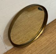 A contemporary circular gold painted hall mirror (Dia98cm)