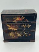A small black lacquer wood table top chest of drawers (H17cm W17cm D8cm)