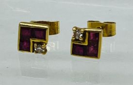 A pair of 18ct ruby and diamond square earrings