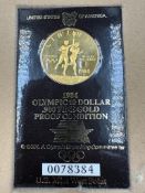 A 1984 United States Olympic 10 Dollar 900 Fine Gold Proof Coin, in case with certificate 0078384