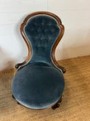 A button back bedroom chair