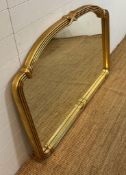 A wooden gold painted over mantel mirror 92cm x 138cm