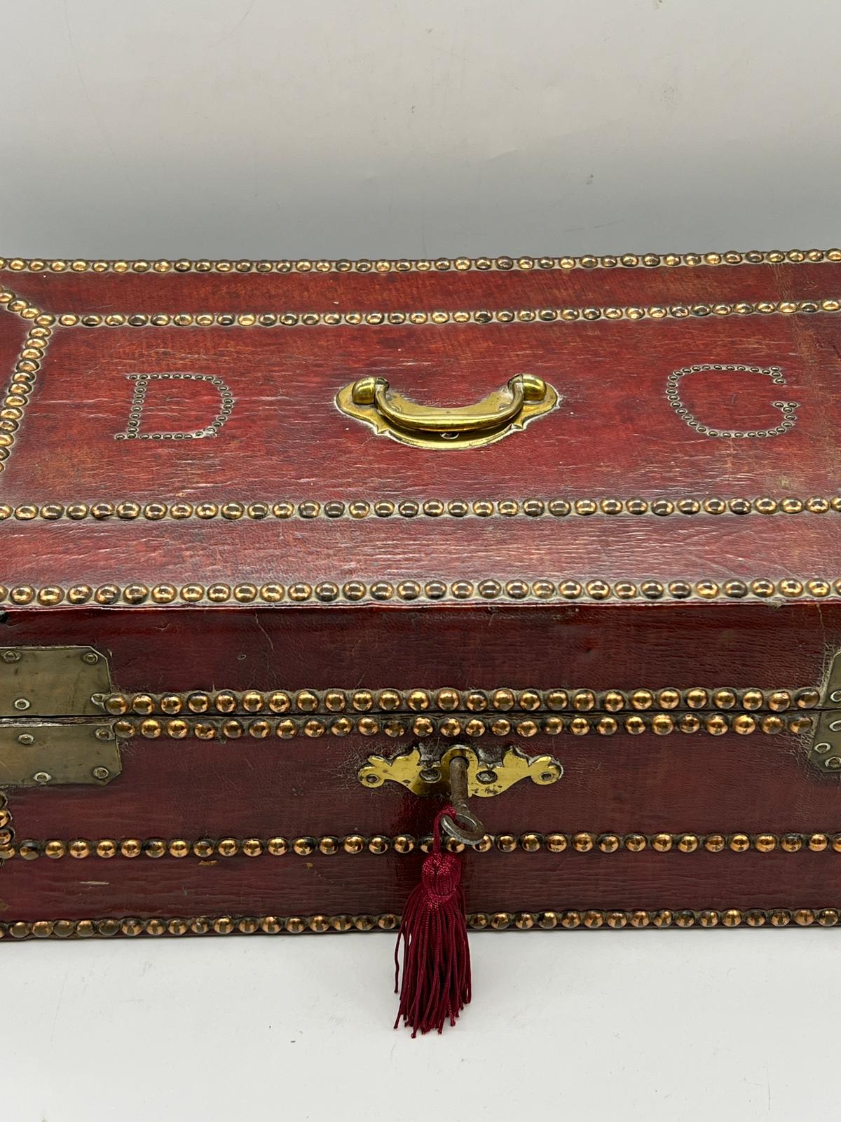 A red leather deed box decorated with studs brass plate corners. The initials DG are embedded with - Image 3 of 6