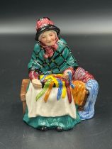 A Royal Doulton figure 'Silks and Ribbons', approximately 11cm H